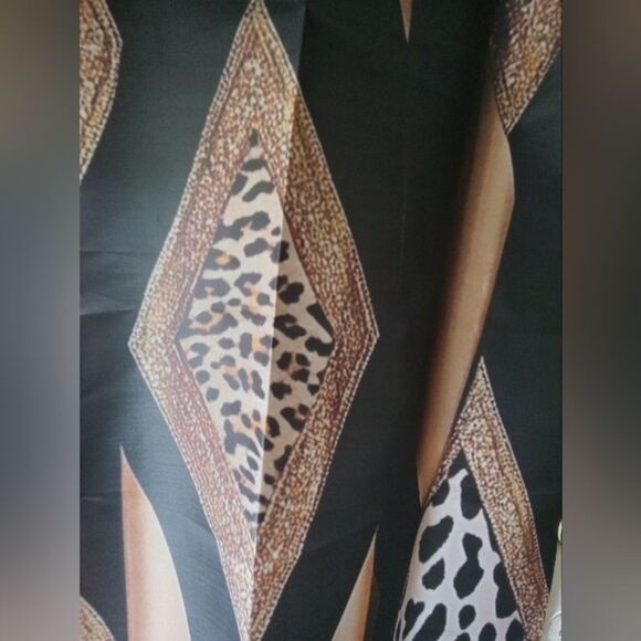 Animal & Geometric Print. Two NEW Curtain Panels. 28"W X 60"L - Picture 4 of 5